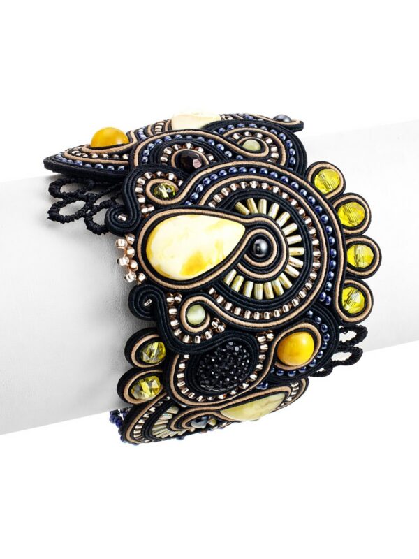 19_11.jpg Luxurious Braided Bracelet with inserts of Natural Amber