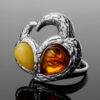 Bright-ring-with-an-insert-made-of-natural-amber-1.jpeg Bright Ring with an insert made of Natural Amber