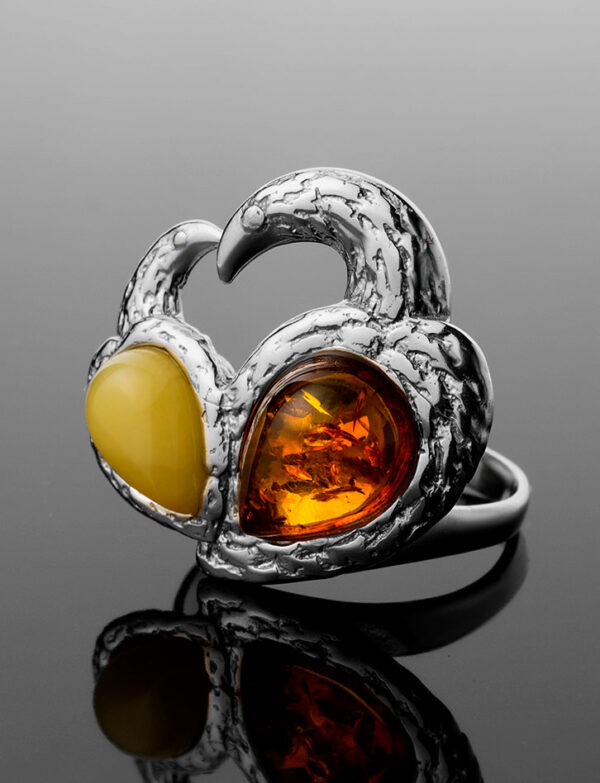 Bright-ring-with-an-insert-made-of-natural-amber-1.jpeg Bright Ring with an insert made of Natural Amber