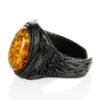 Leather-ring-with-large-sparkling-greenish-amber-1.jpeg Leather Ring with Large Sparkling Amber