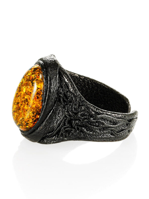 Leather-ring-with-large-sparkling-greenish-amber-1.jpeg Leather Ring with Large Sparkling Amber