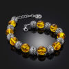 Openwork-bracelet-Aphrodite-with-molded-lemon-amber-1.jpeg Baltic Sun Bracelet