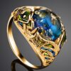 Luxurious Ring with Blue Amber "Peacock"
