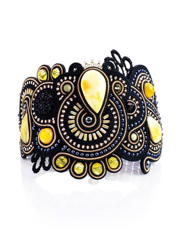 roskoshnyy_pletyenyy_braslet_so_vstavkami_iz_naturalnogo_medovogo_yantarya_indiya_v_chyernom_tsvete1.jpg Luxurious Braided Bracelet with inserts of Natural Amber