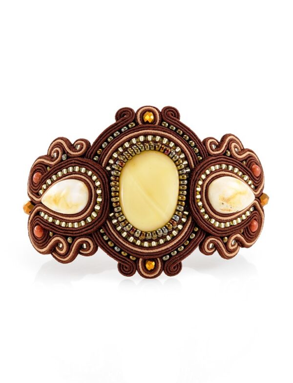 roskoshnyy_pletyenyy_braslet_so_vstavkami_iz_naturalnogo_yantarya_indiya1.jpg Luxurious Braided Bracelet with inserts of Natural Amber